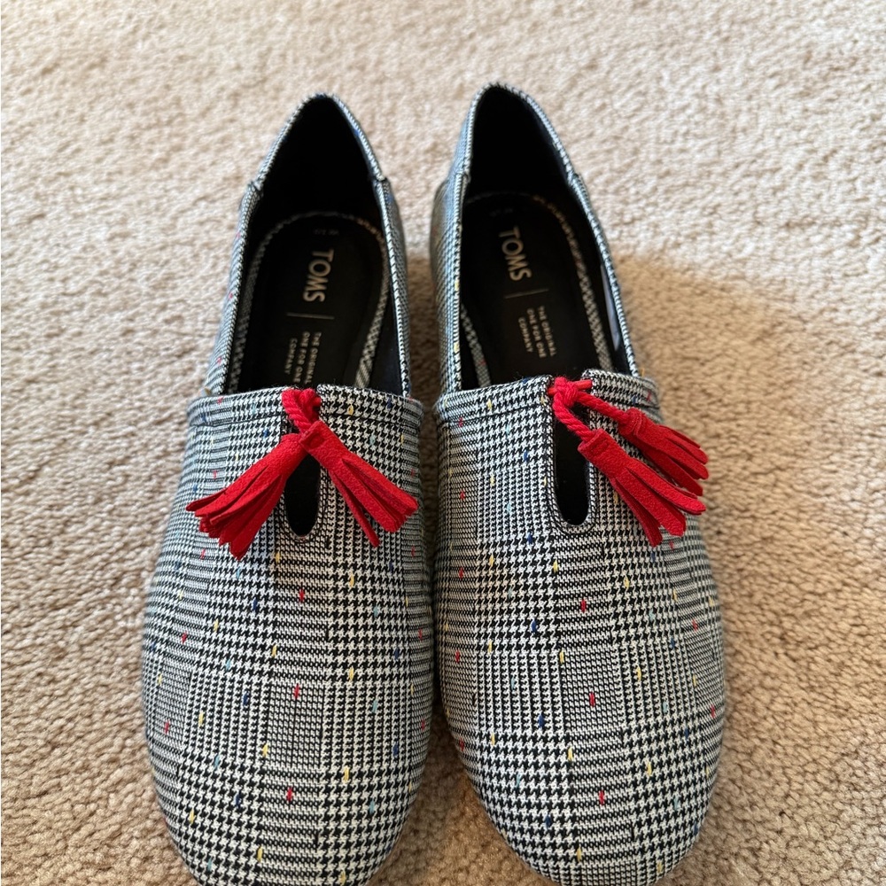 Toms Black and White Slip-On Flats with Red Accents
